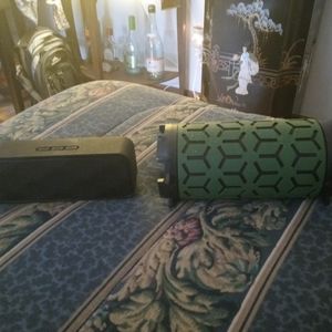 Two bluetooth speakers